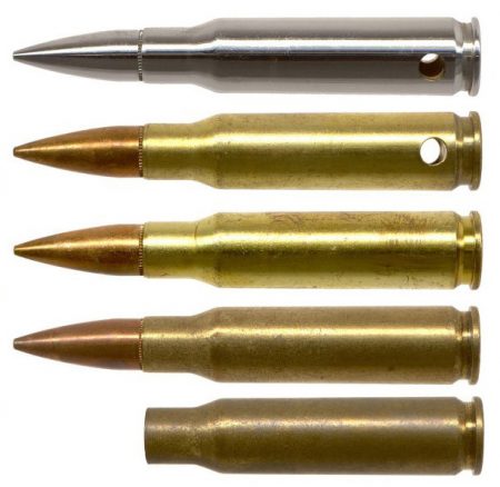 Lot 113 - Group of five 7.62×51 NATO “Tombstone” dummy cartridges: HWS Vol. III, page 231, Fig. 316. IAA Cartridge of the Month, October 2008. Chrome plated with holes, Unplated with holes, Unplated without holes, Unplated without holes (light strike headstamp), and unplated unprimed empty with light strike headstamp. Ex-Woodin collection. $200-250
