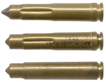 Lot 132 - A trio of three AAI Cal. .224 cartridges for the AAI-developed CHEVRON Assault Pistol Model 8047. All three with the same “D A 6 5” headstamp. The live round has a piston primer, and the two dummies have no primers. The live round has a fluted case, but only one of the dummies does. The two fluted cases have a belt at the head, but the smooth-case dummy does not. All three have short, pointed projectiles. HWS Vol. III, page408-409, Figs. 589 and 590. Ex Woodin collection. $300-500