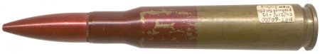 Lot 4 - .50 BMG, headstamp “MF 85.” Front half of case and bullet colored red. High Pressure Test, one of only 12 produced for ODL of New Zealand. Reference: Bill Woodin note. Ex-Woodin collection. $250-350