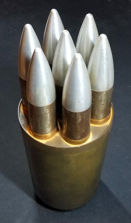 Lot 83 - 30mm – 7-projectile composite (all metal) round, U. S. Navy manufacture. In competition with early revolver guns. Tested at Dahlgren 1955-56, or later. Used modified USN 4”/50 Caliber case. For ship-mounted AA gun having multiple barrels. Also tested in 5- and 3-projectile types (and 3- and 5-projectile 20mm types using modified 3”/50 caliber rimless-grooveless case). Ex-Woodin collection. $1,500-2,000