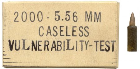 Lot 99 - Original Frankford Arsenal 20-round box for 5.56mm Caseless Vulnerability Test cartridges. Now contains one cartridge in excellent condition, black with red primer and GM bullet. Ex-Woodin collection. $65-85